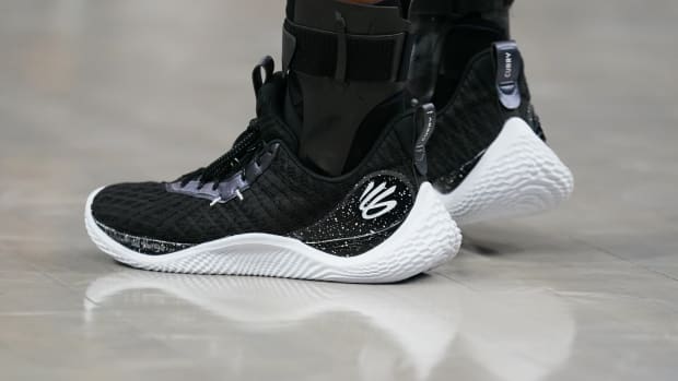 View of Stephen Curry's black and white Under Armour shoes.
